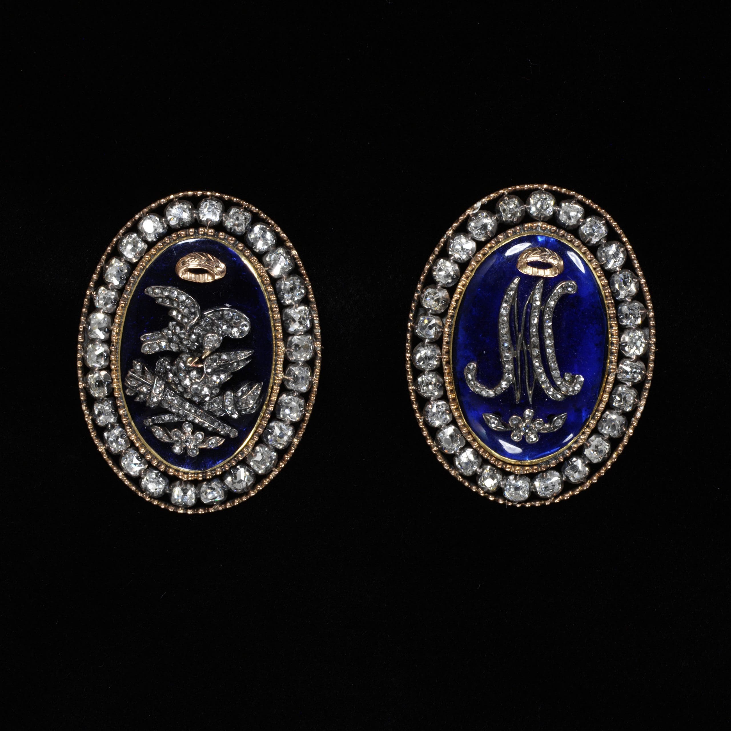 Bracelet clasps, France, Gold with brilliant cut diamonds, central plaques of blue paste (glass). © Victoria and Albert Museum, London