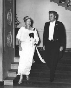 President John F. Kennedy and Grand Duchess Charlotte of Luxembourg descend the Grand Staircase for a dinner in honour of the Grand Duchess